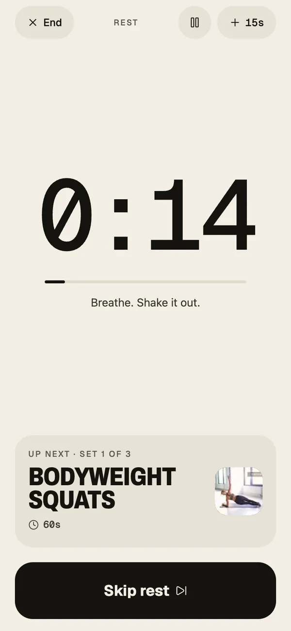 The rest screen on a light paper background: a 0:14 countdown, Breathe. Shake it out., up next Bodyweight Squats, and a black Skip rest button.